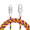 Introducing the Rainbow USB-C to Lightning Cable from ChargeCords. This 10 ft / 3m long, Apple MFi Certified iPhone charging cable boasts a Lightning connector on one end and a USB-C connector on the other. The braided design features vibrant strands in red, orange, yellow, green, blue, and purple hues with sleek metallic silver connectors accented by an eye-catching lightning bolt symbol.